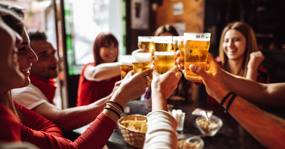 Stock image of a group of people with beer