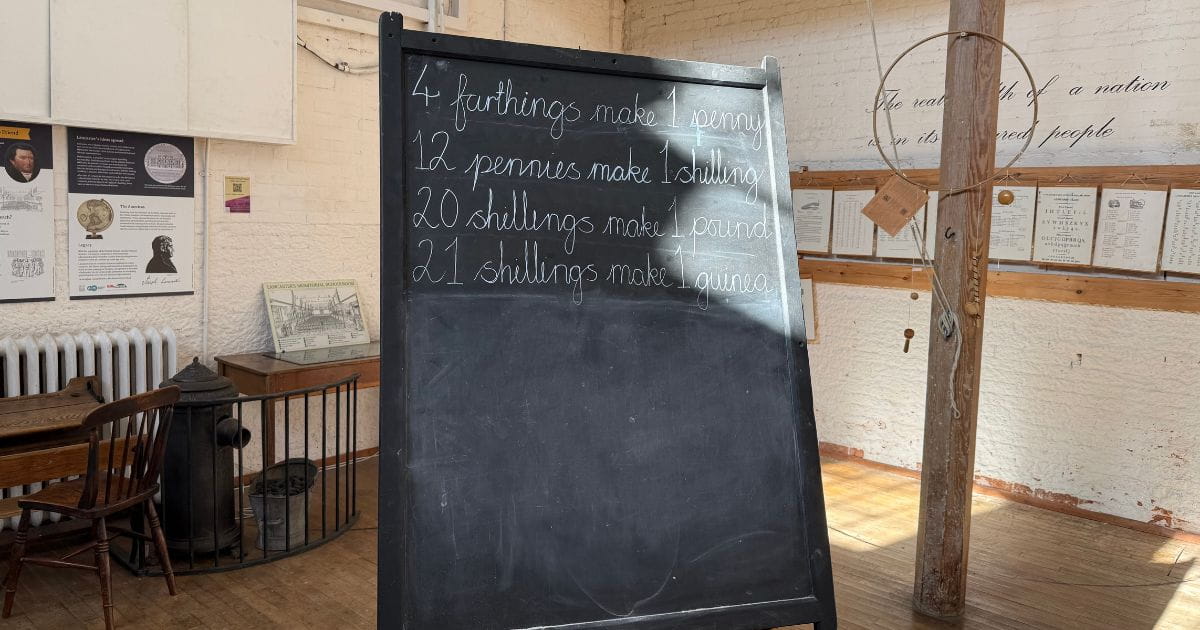 Close-up of a vintage blackboard and teaching equipment in Hitchin