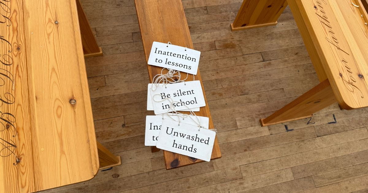 Exhibit showing Victorian school punishments historical teaching methods at Hitchin museum