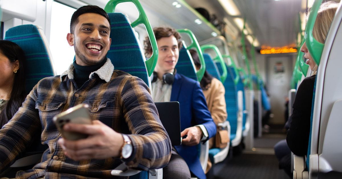 People smiling on a Great Northern train