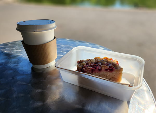 Close up of coffee and a cake