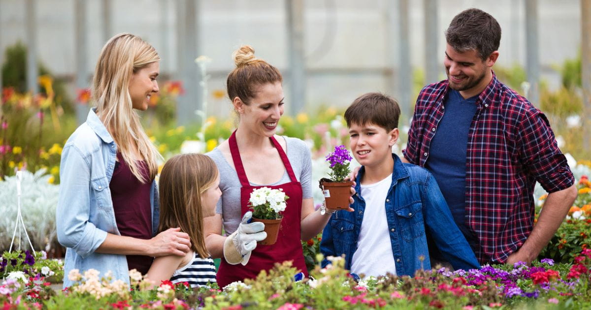 Family enjoying a day out together at the RHS Sandringham Flower Show with activities for all ages