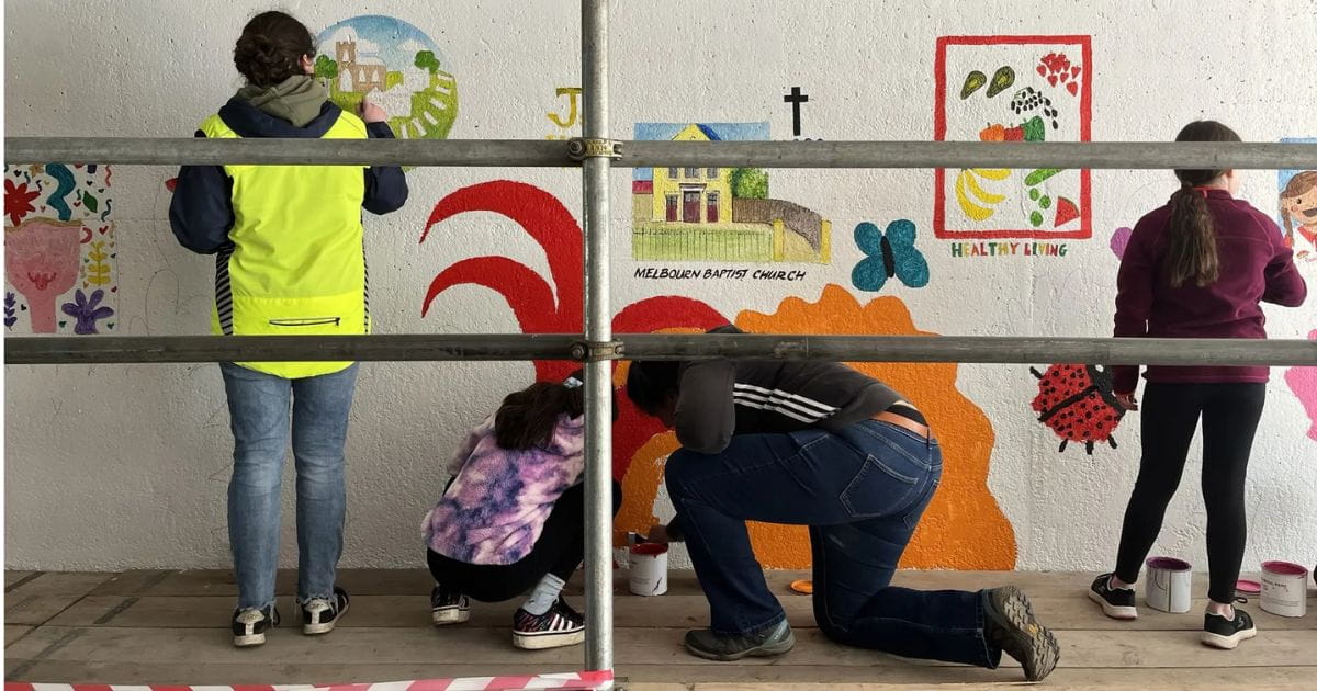 Volunteers painting Meldreth 'Wonderpass' Underpass